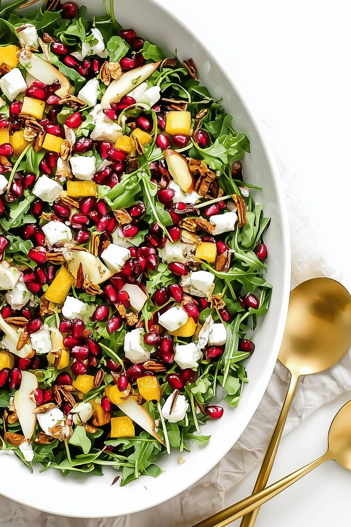 Winter Holiday Salad with pomegranate, pear, pistachios, and goat cheese