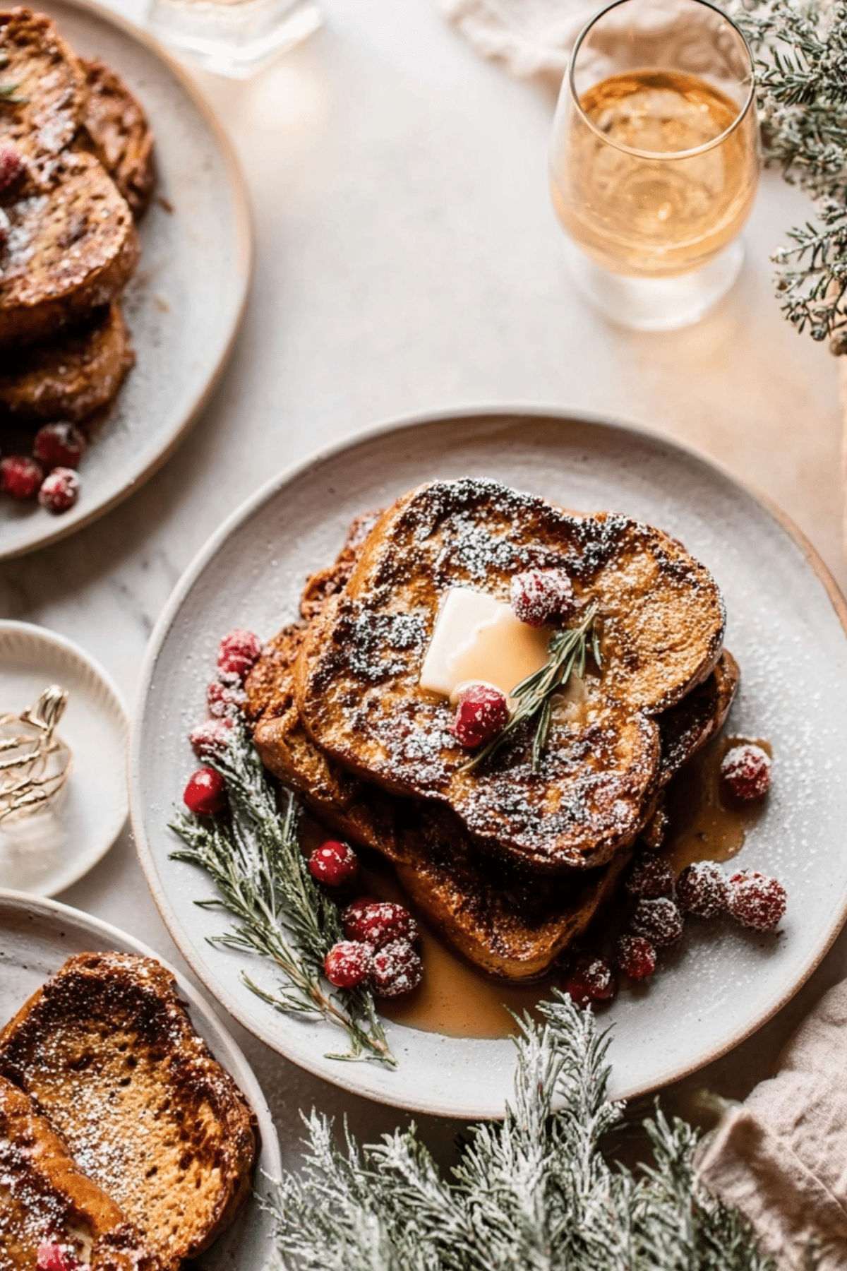 gingerbread french toast topped with maple syrup and powdered sugar
