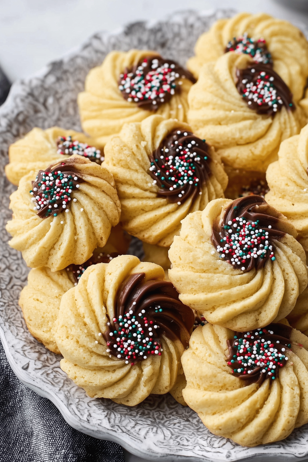 Danish Butter Cookies dipped in chocolate with sprinkles