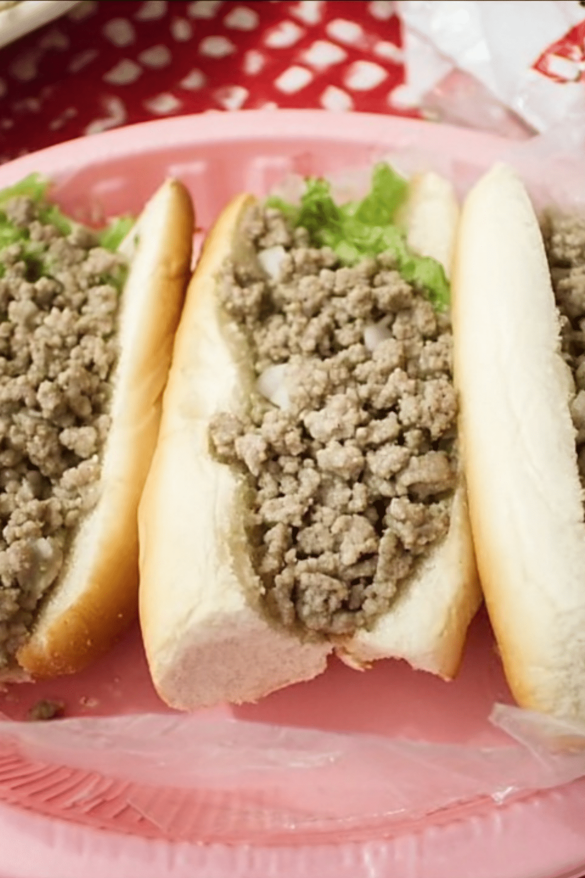 Philly cheesesteak sandwich with melted cheese and ground beef