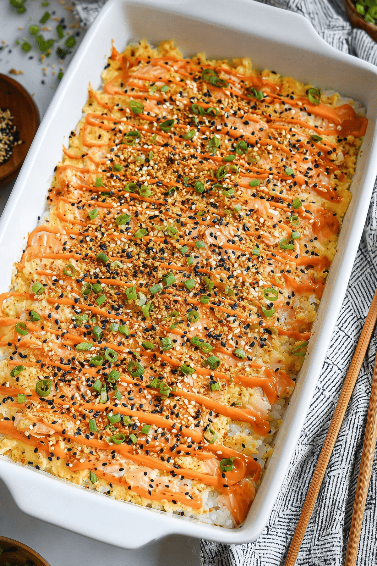 Salmon Sushi Bake with creamy topping and seasoned rice