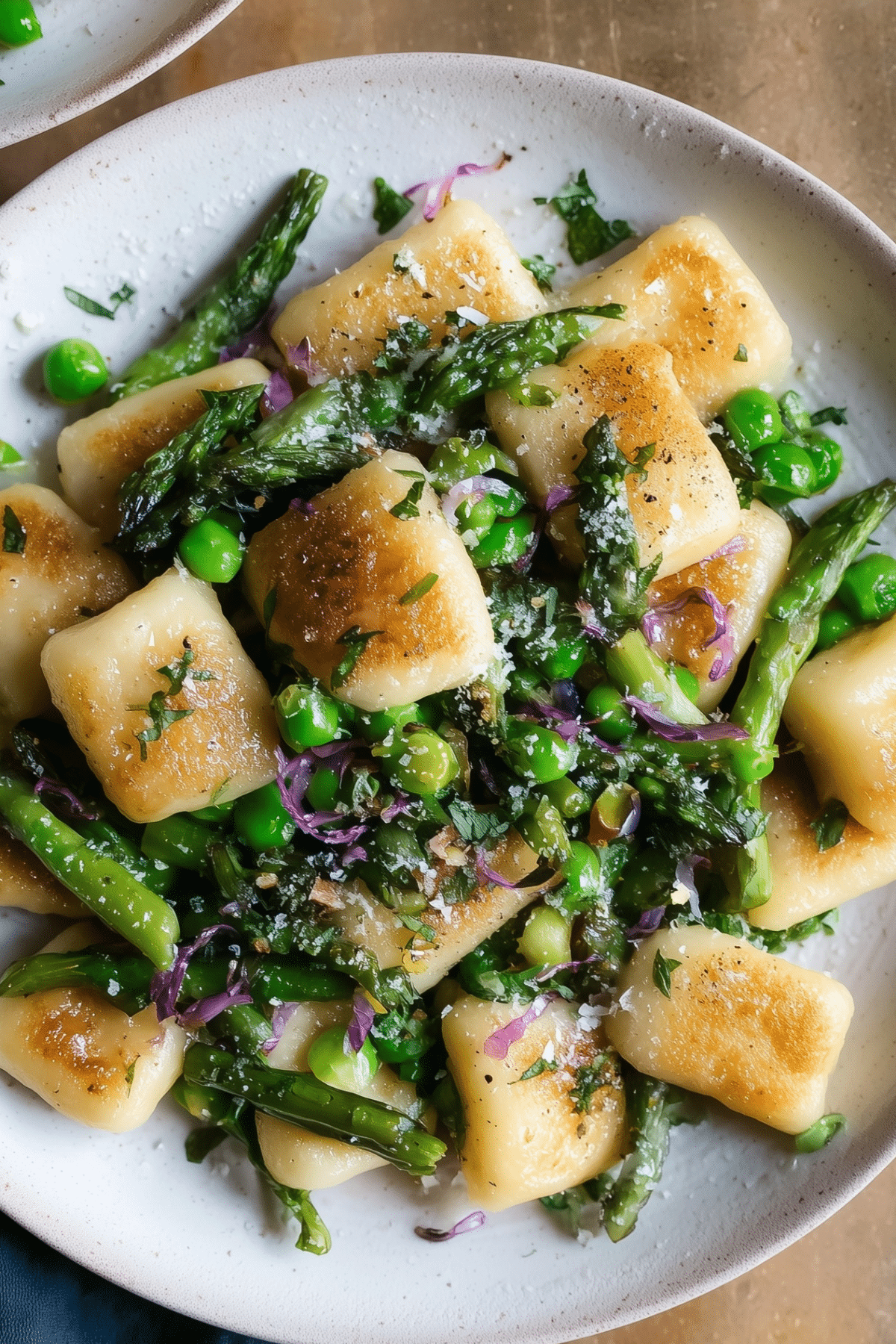 Spring Vegetable Brown Butter Gnocchi with asparagus and peas in brown butter sauce