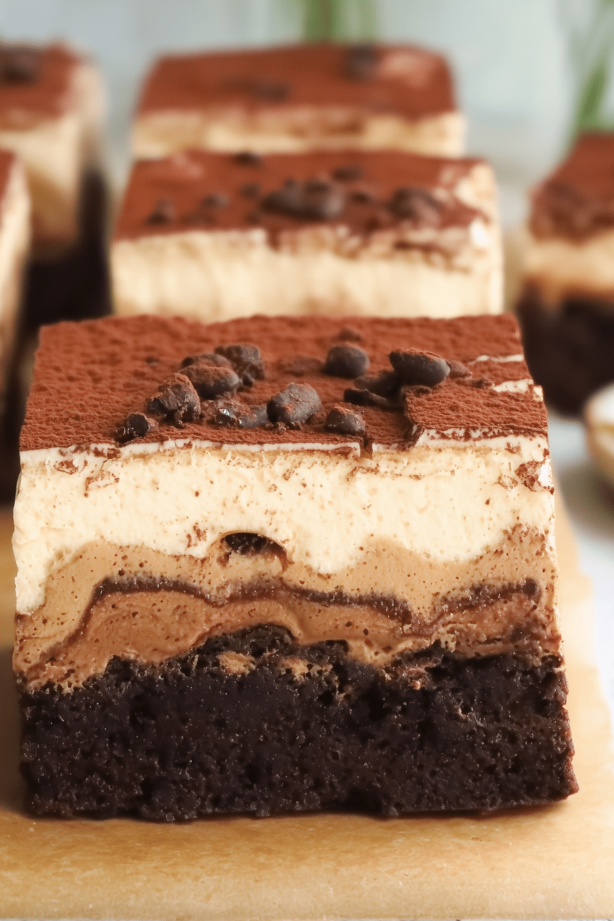 Tiramisu Brownies with mascarpone topping and cocoa powder
