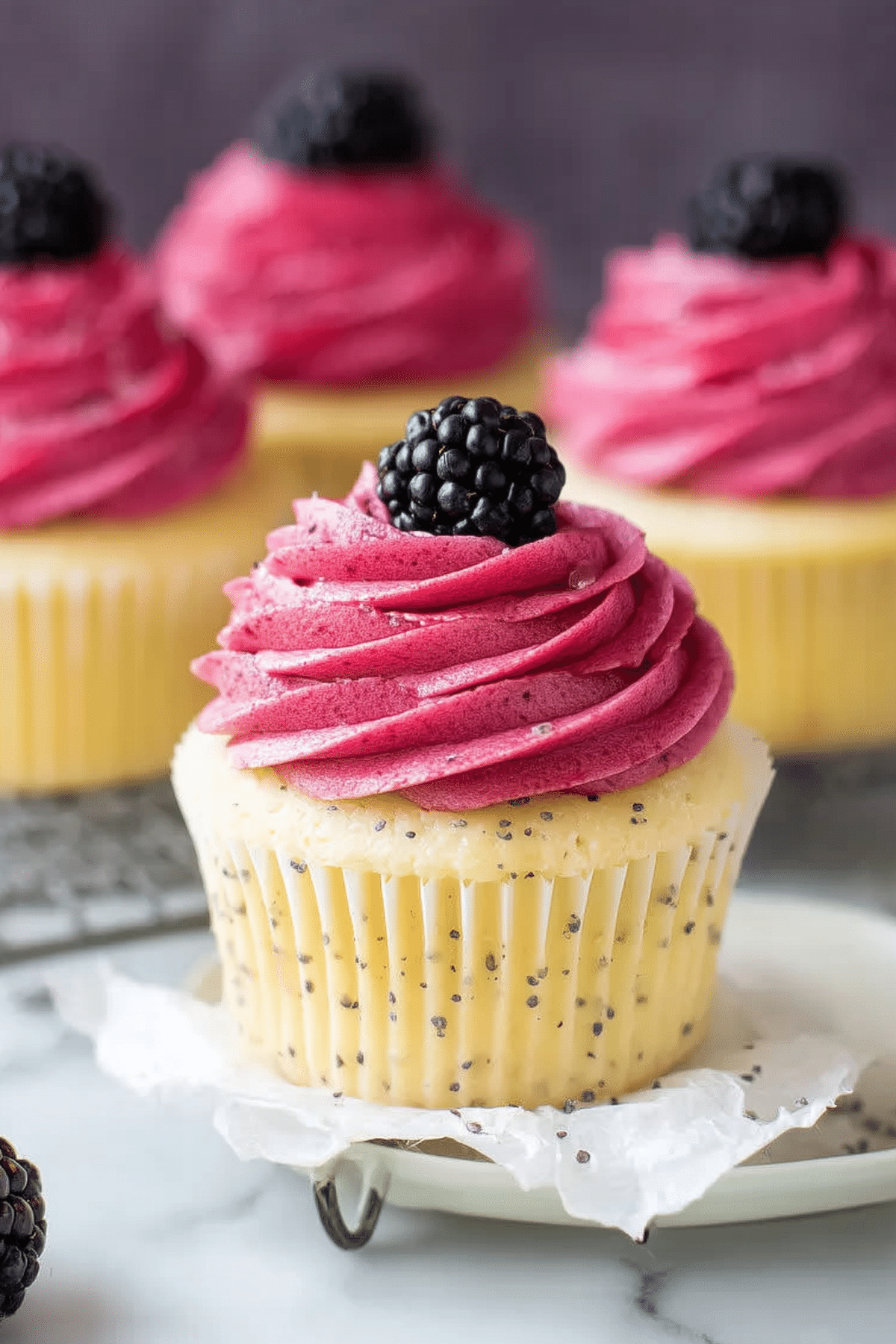 lemon poppy seed cupcakes with creamy frosting