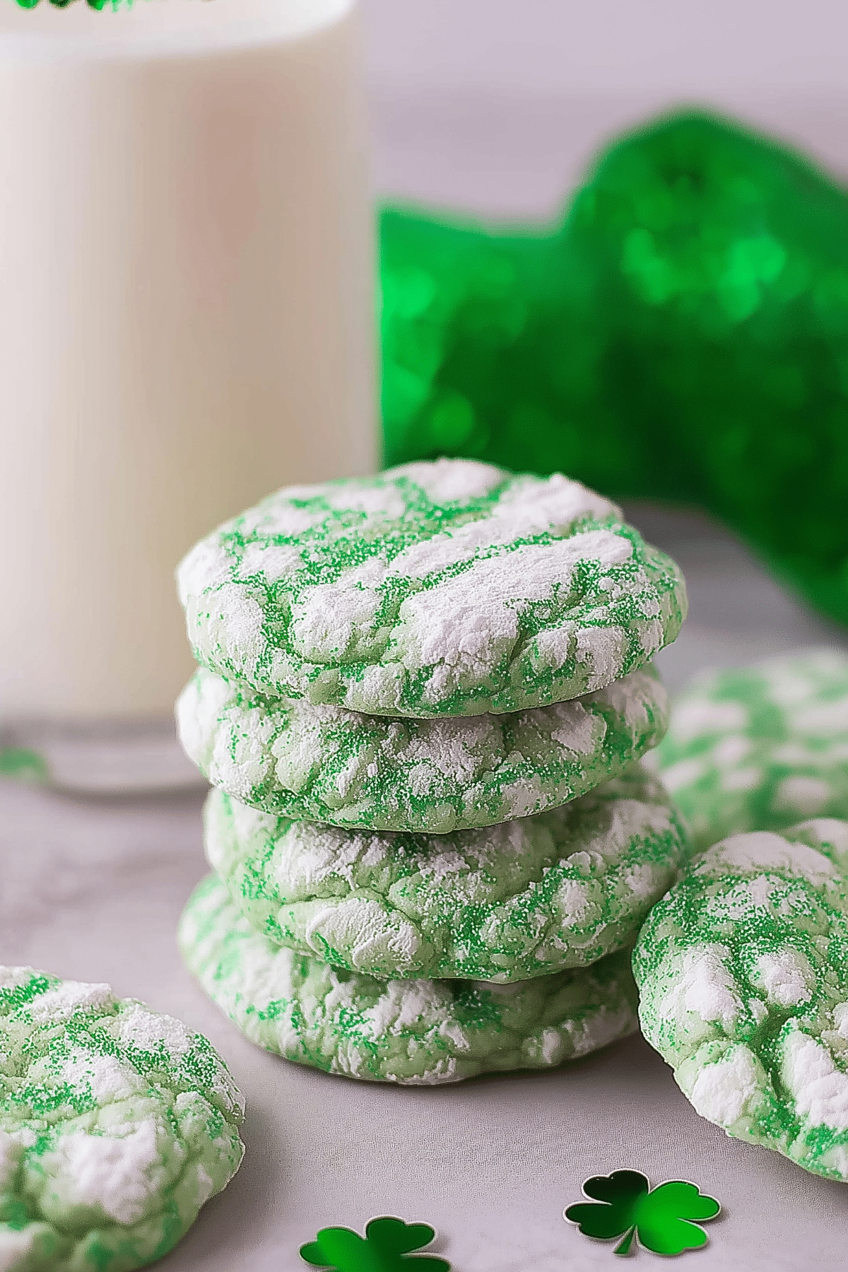 St Patrick’s Day Cookies coated in powdered sugar with green crinkle texture