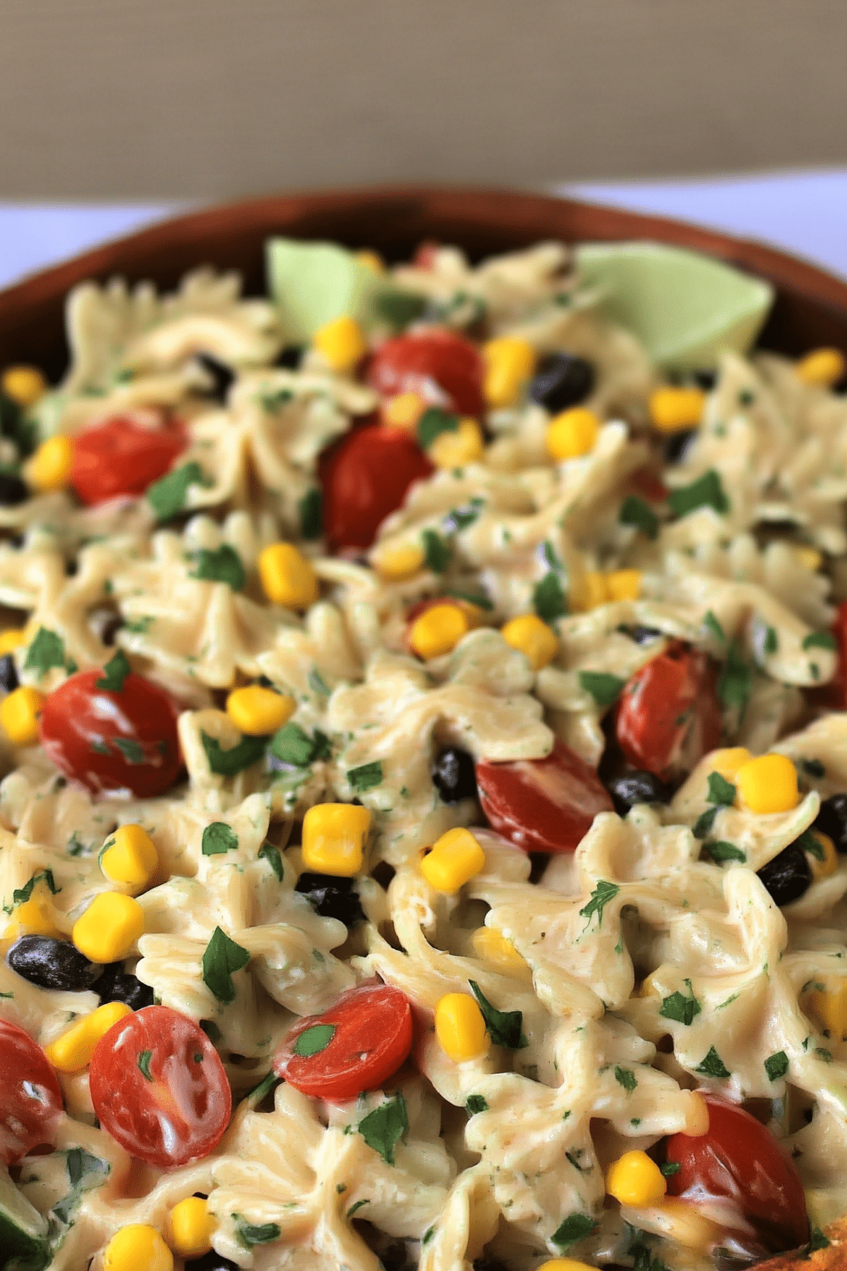 cilantro lime pasta salad with avocado, corn, and creamy lime dressing