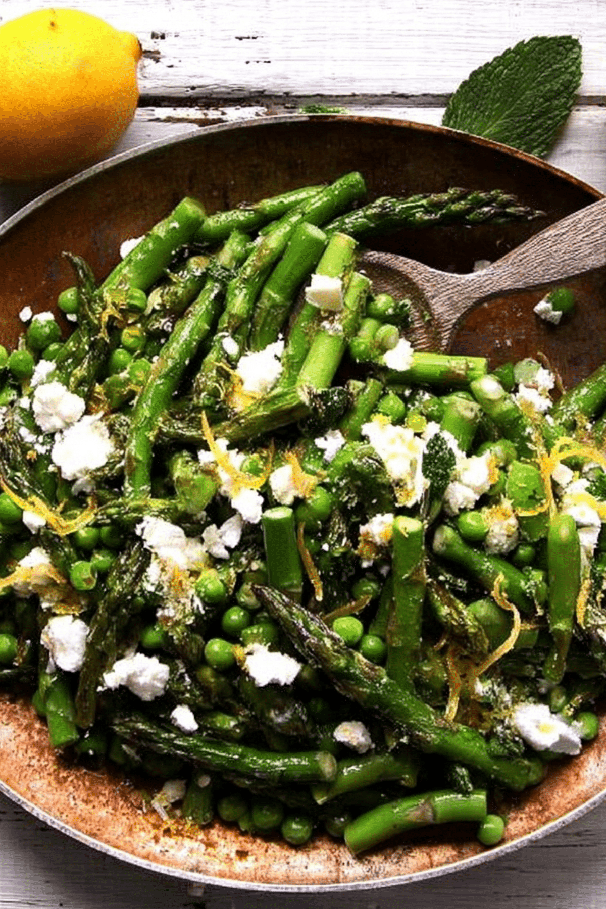 Fresh Asparagus Salad with peas, feta, lemon, and fresh herbs